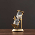 Antik timeglas lavet af messing med violet sand