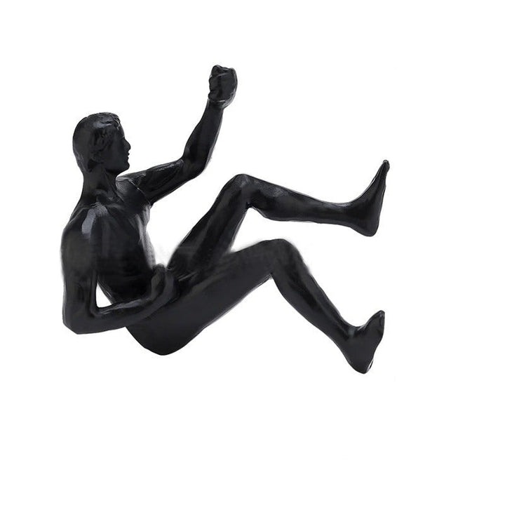 Klatrevæg hængende statuer