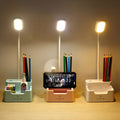 Skrivebordslampe med telefonholder