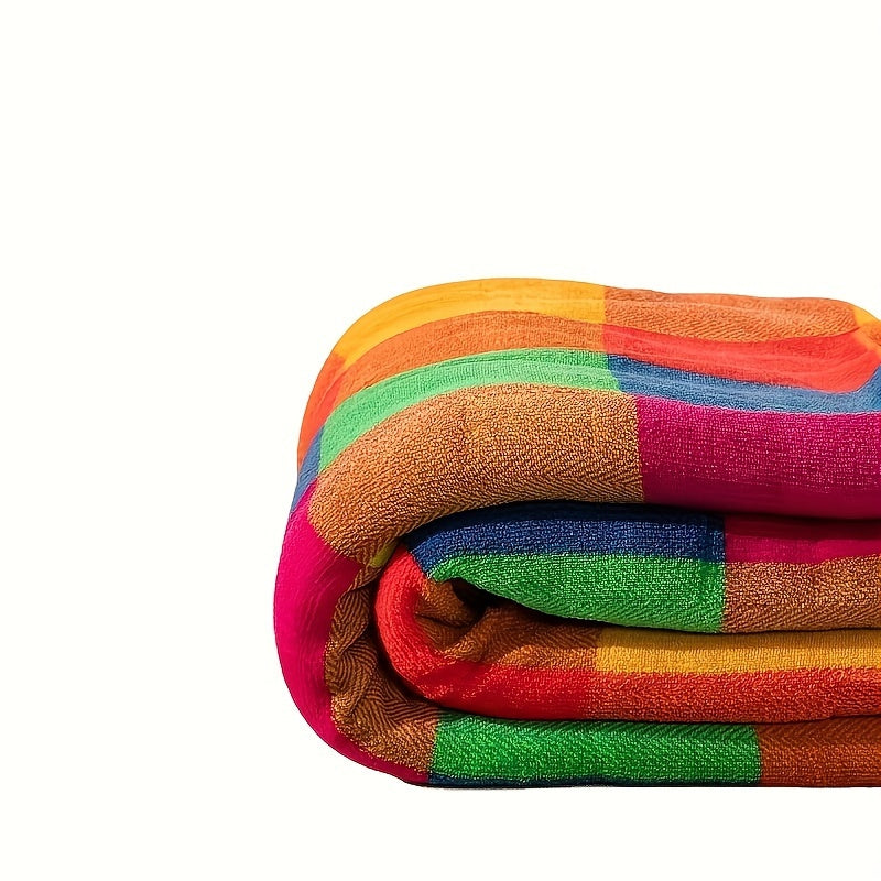Koralfleece tæppe – Vendbart tykt Sherpa tæppe med et farverigt ternet mønster