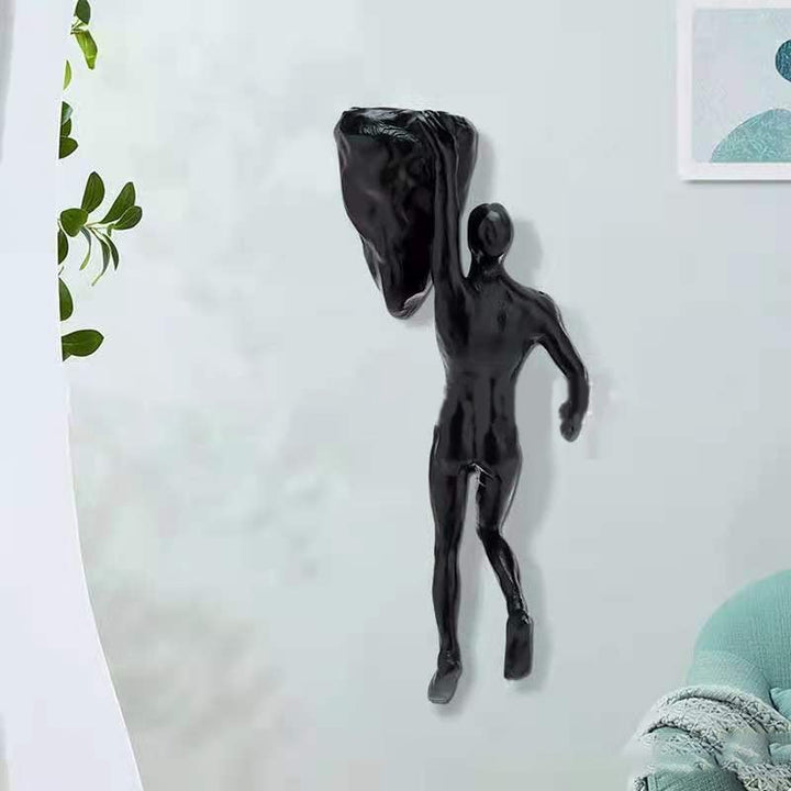 Klatrevæg hængende statuer
