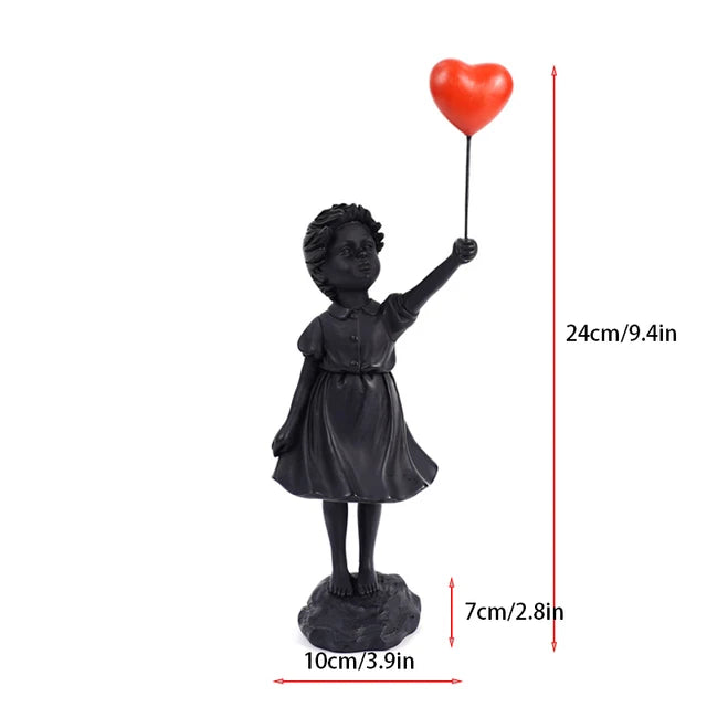 Skulptur af en pige med ballon i Banksy-stil til borddekoration og kreativ stueindretning