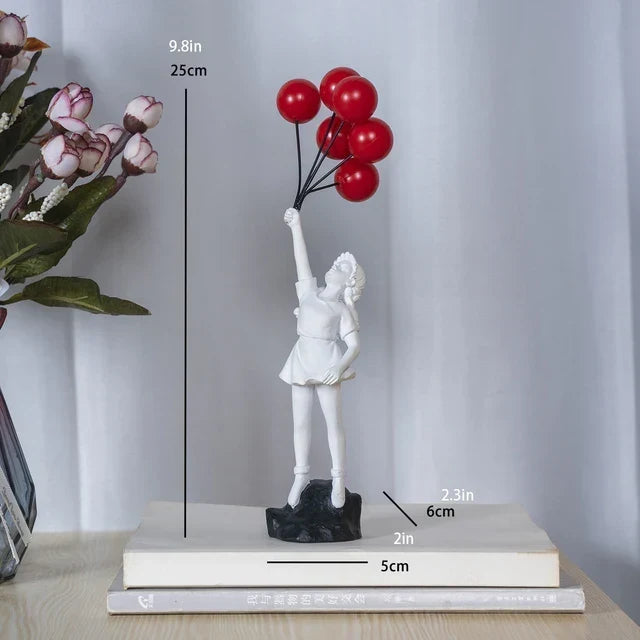 Skulptur af en pige med ballon i Banksy-stil til borddekoration og kreativ stueindretning