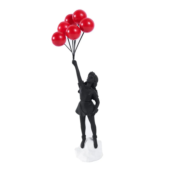 Skulptur af en pige med ballon i Banksy-stil til borddekoration og kreativ stueindretning