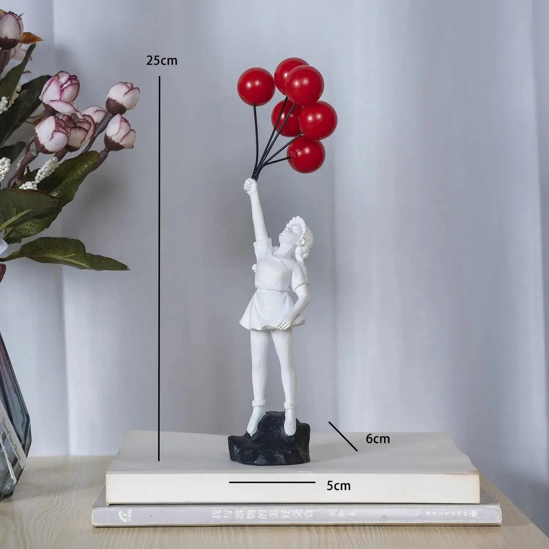 Banksy flyvende Ballonpige Statue