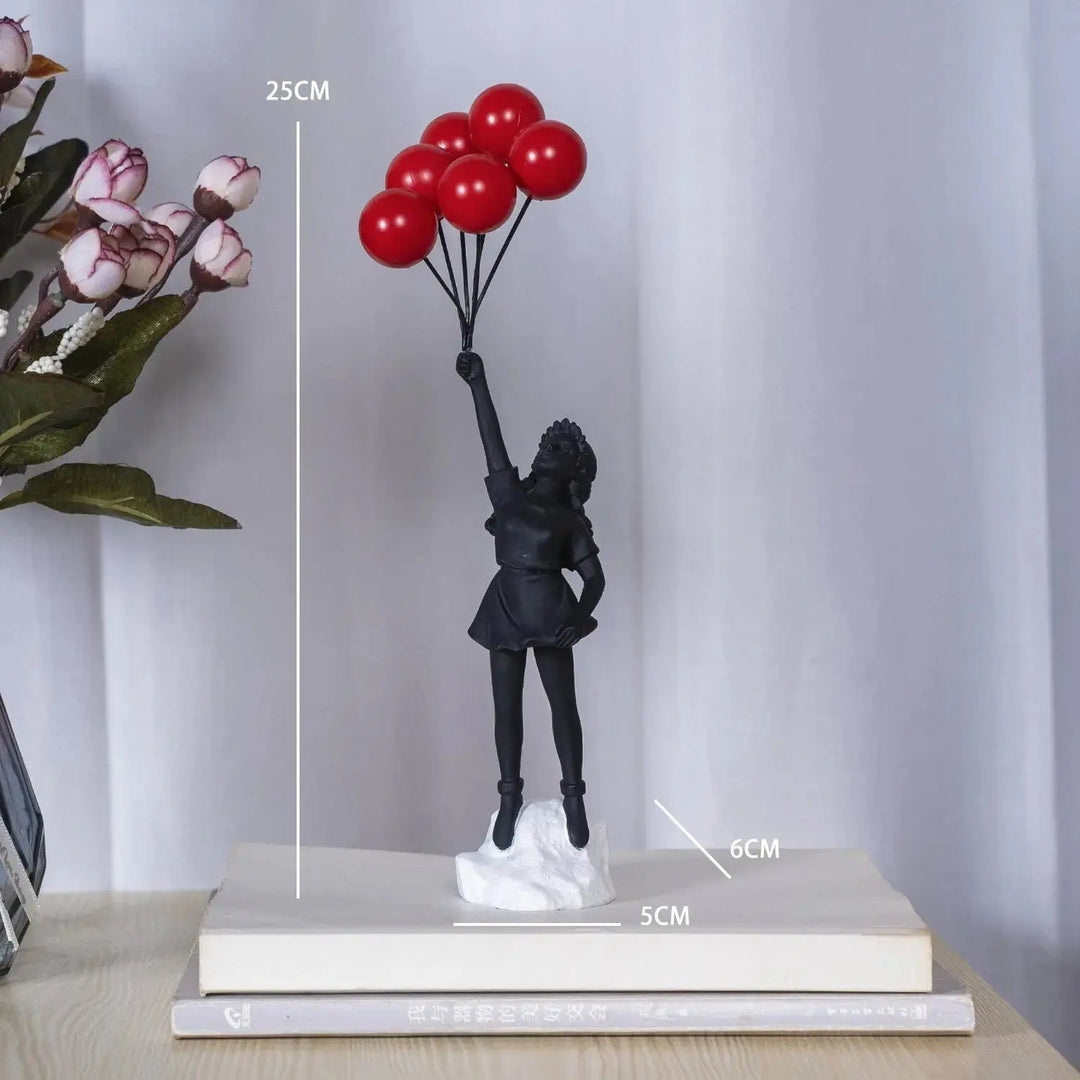 Banksy flyvende Ballonpige Statue
