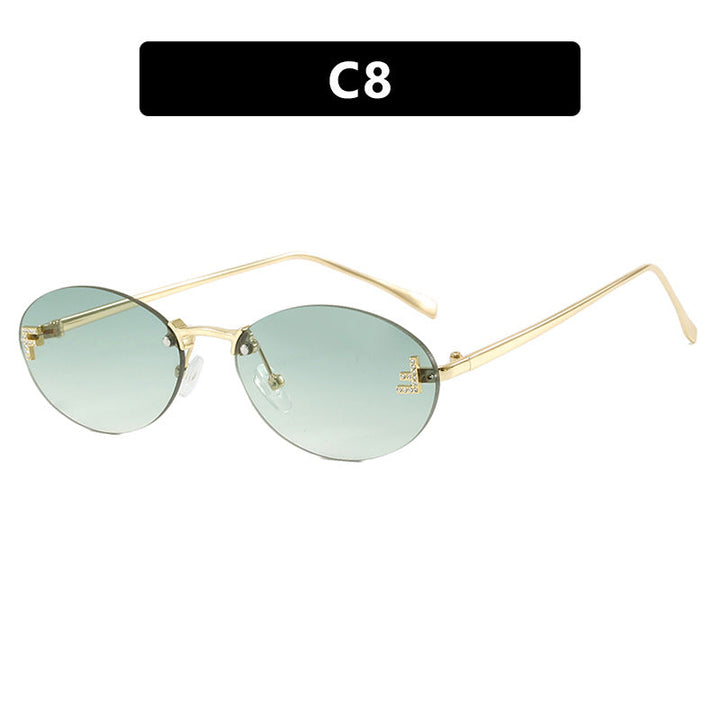 Kvindernes fashionable solbriller med elegant spejl-linse front og delikat metalramme