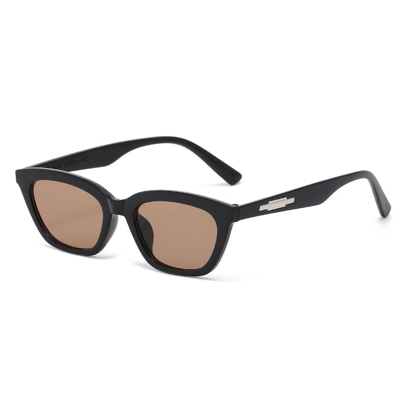 Kvinders fashionable Cat-Eye solbriller med transparent stel og spejlede linser