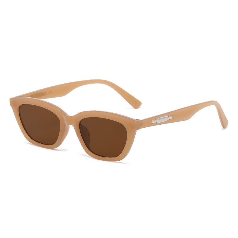 Kvinders fashionable Cat-Eye solbriller med transparent stel og spejlede linser
