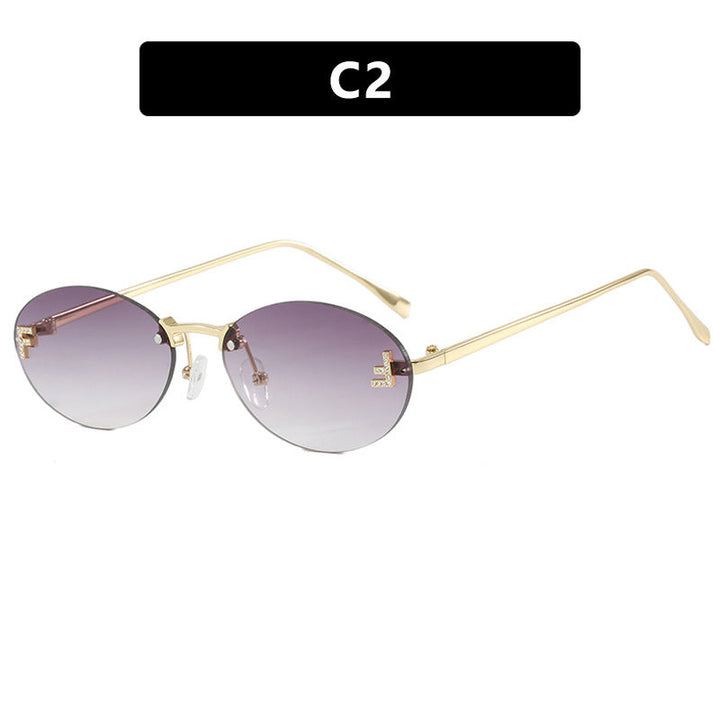 Kvindernes fashionable solbriller med elegant spejl-linse front og delikat metalramme