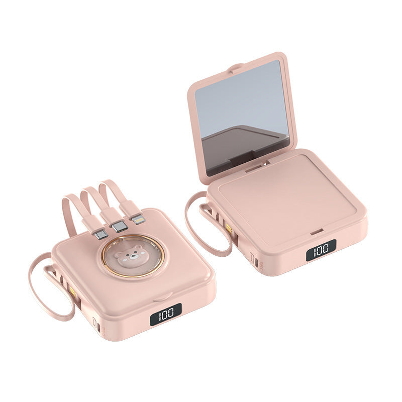 Kompakt powerbank med integreret spejl og multifunktionel ladekabel