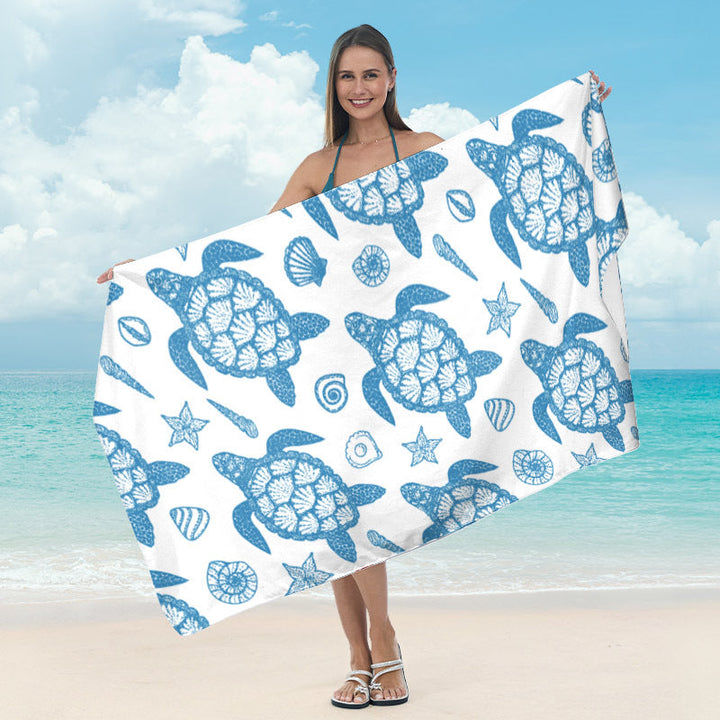 Strandtørklæde med spejlet mandala-design