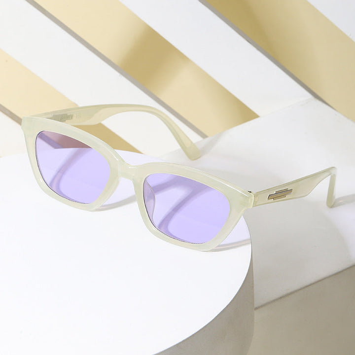 Kvinders fashionable Cat-Eye solbriller med transparent stel og spejlede linser