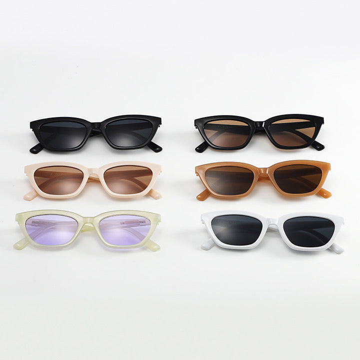 Kvinders fashionable Cat-Eye solbriller med transparent stel og spejlede linser