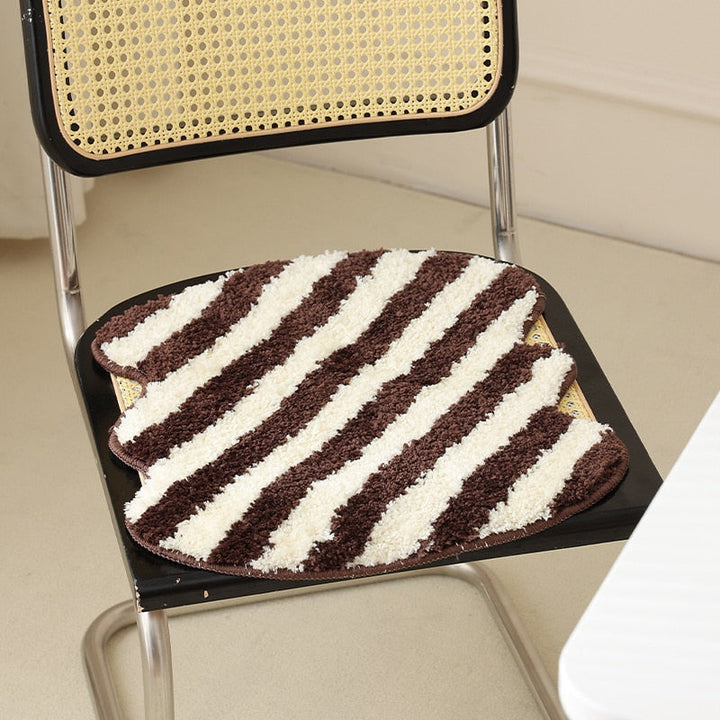 Quilted striped chair cushion
