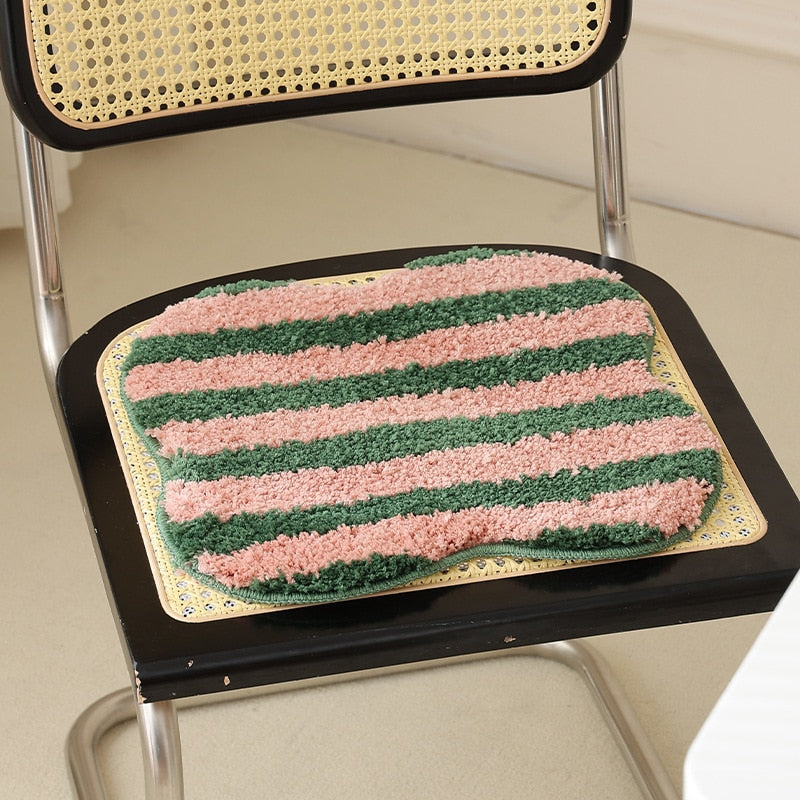 Quilted striped chair cushion