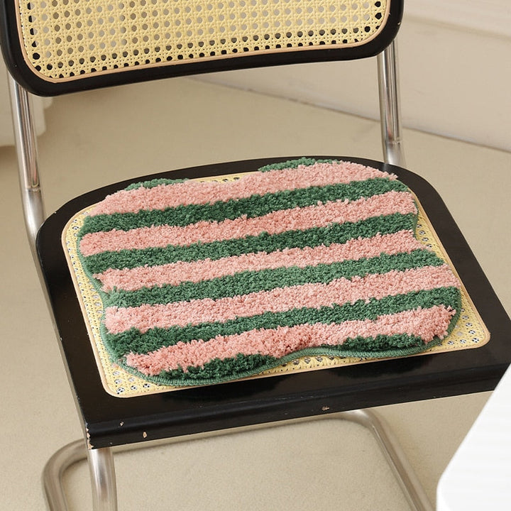 Quilted striped chair cushion