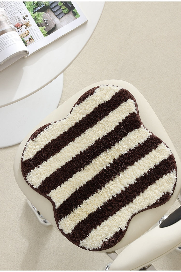Quilted striped chair cushion