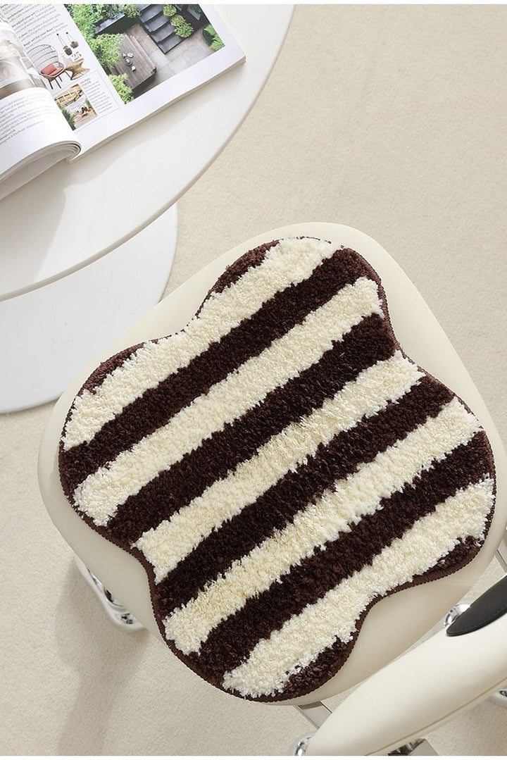 Quilted striped chair cushion