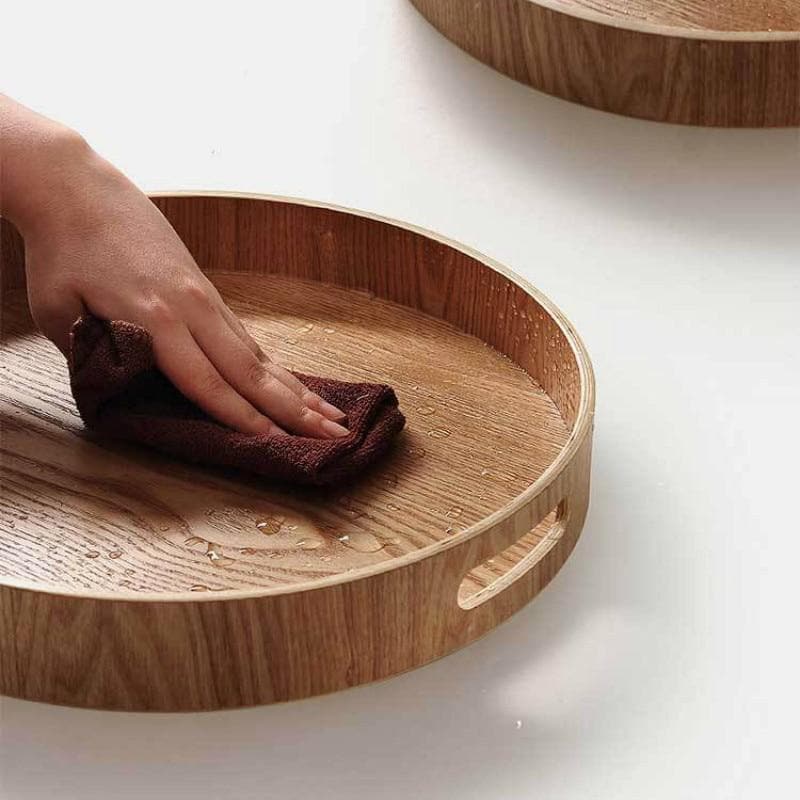 Slanke, runde serveringsbakker lavet af træ