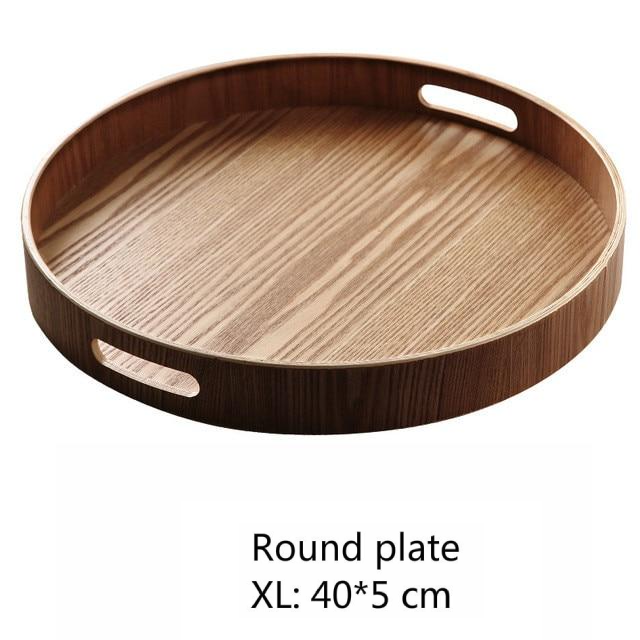 Slanke, runde serveringsbakker lavet af træ