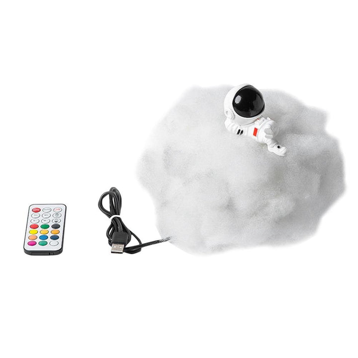 Astronaut farverige skyer natlys |