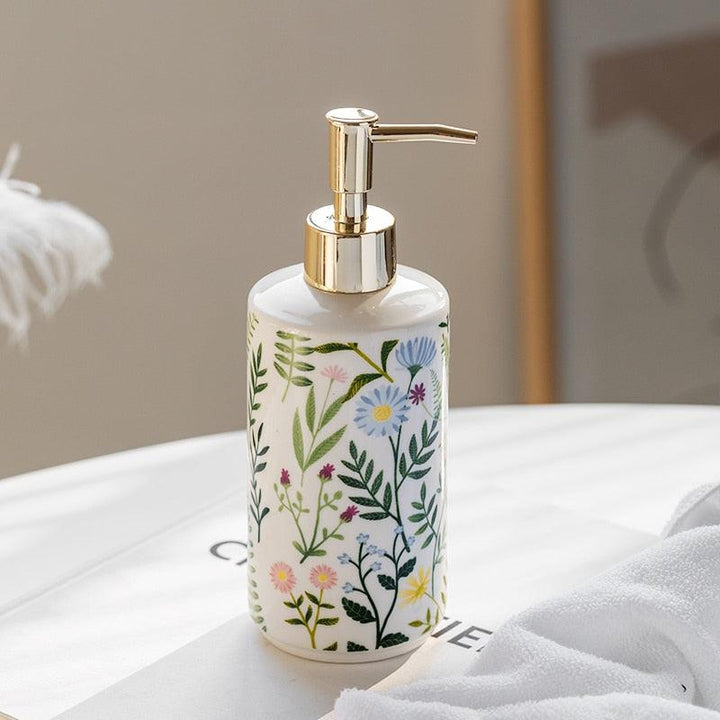 Sæbe dispenser lavet af keramik med blomsterdesign