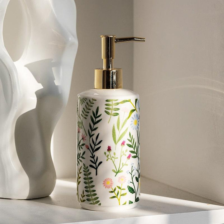 Sæbe dispenser lavet af keramik med blomsterdesign