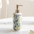 Sæbe dispenser lavet af keramik med blomsterdesign