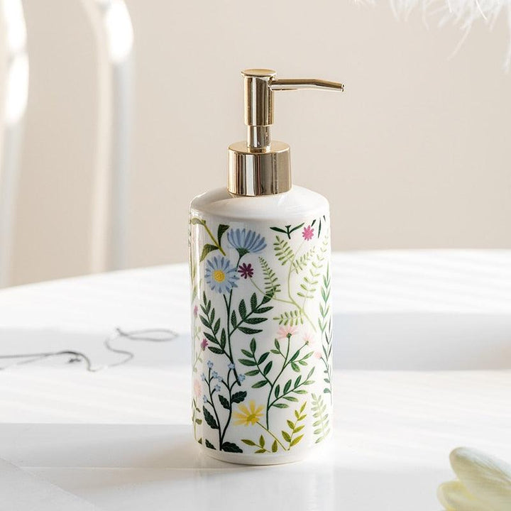 Sæbe dispenser lavet af keramik med blomsterdesign