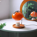 Glas bordlampe i retro stil med fod